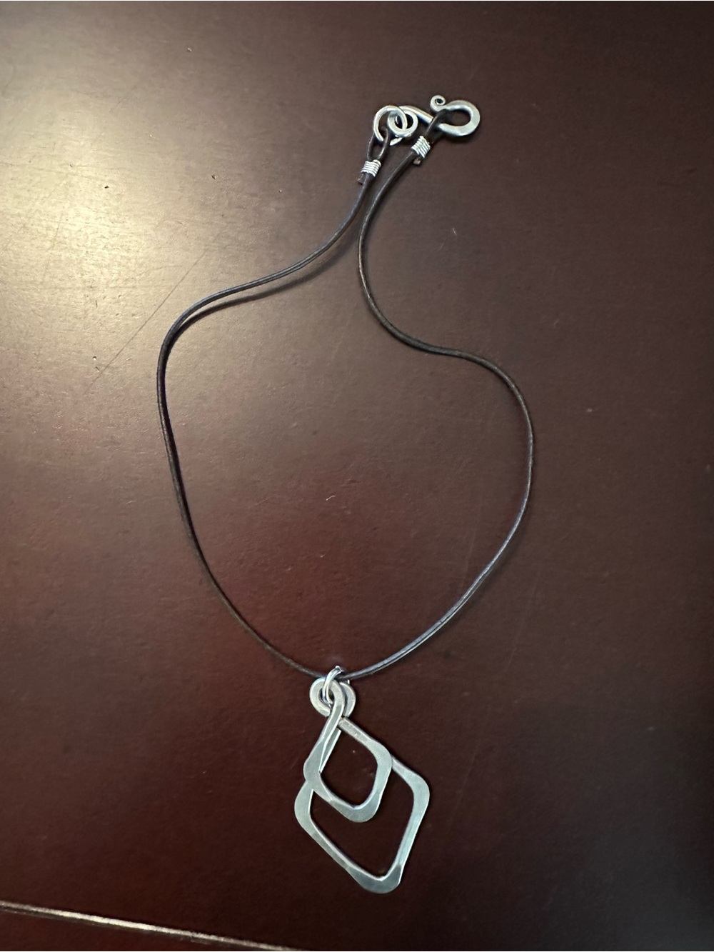 Silver Double Geometric Pendant Necklace on Black Cord